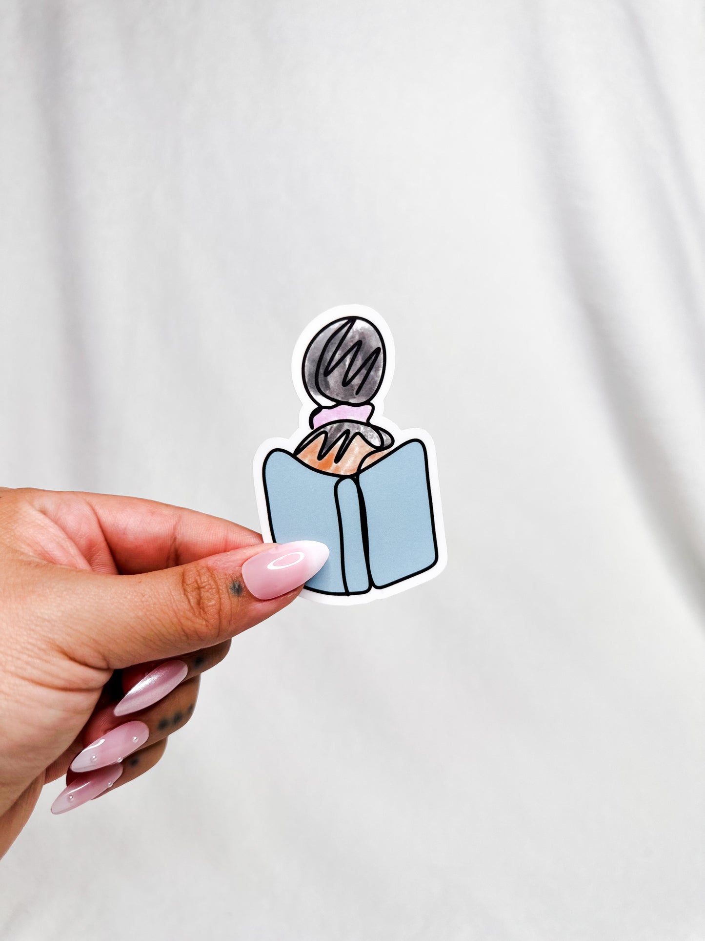 Messy Top Bun While Reading a Book Die Cut Sticker